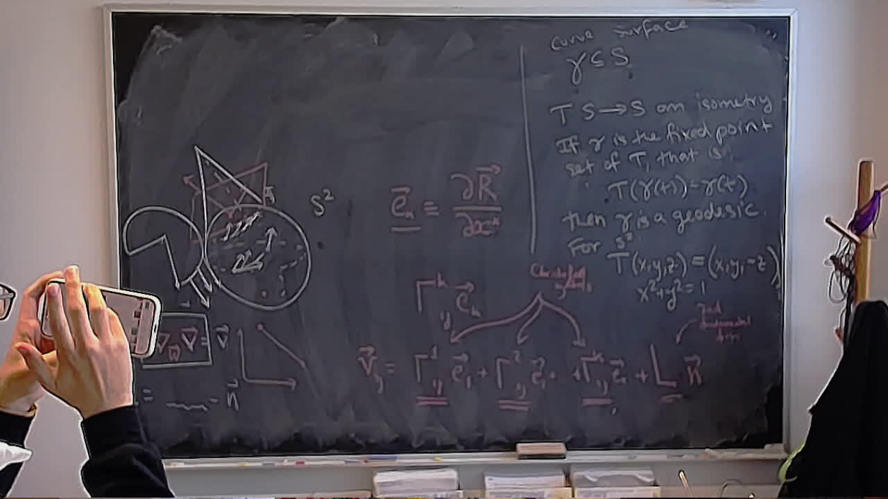 A photo of a whiteboard titled: Geodesics