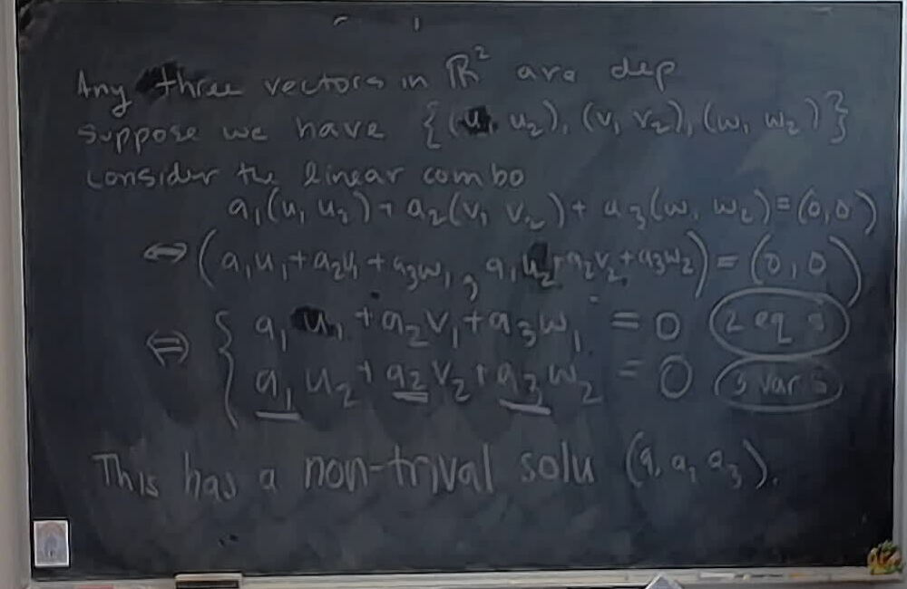 A photo of a whiteboard titled: Any three vectors in two-dimensional space are dependent.