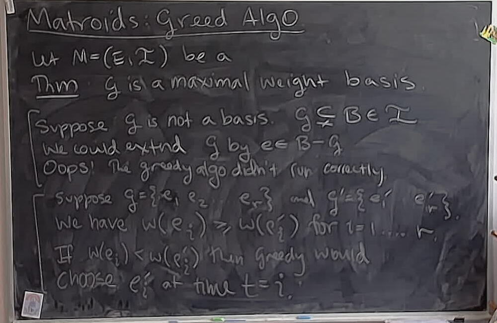 Matroids: Greedy Algorithm (Part 2) A photo of a whiteboard titled: Matroids: Greedy Algorithm (Part 2)