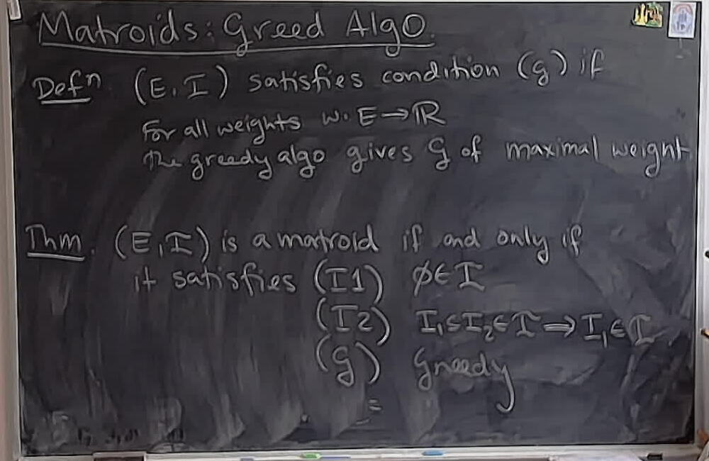 Matroids: Greedy Algorithm (Part 3) A photo of a whiteboard titled: Matroids: Greedy Algorithm (Part 3)