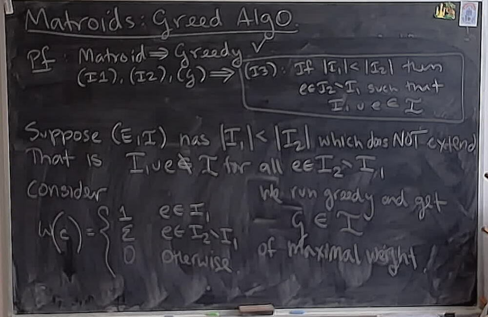 Matroids: Greedy Algorithm (Part 4) A photo of a whiteboard titled: Matroids: Greedy Algorithm (Part 4)